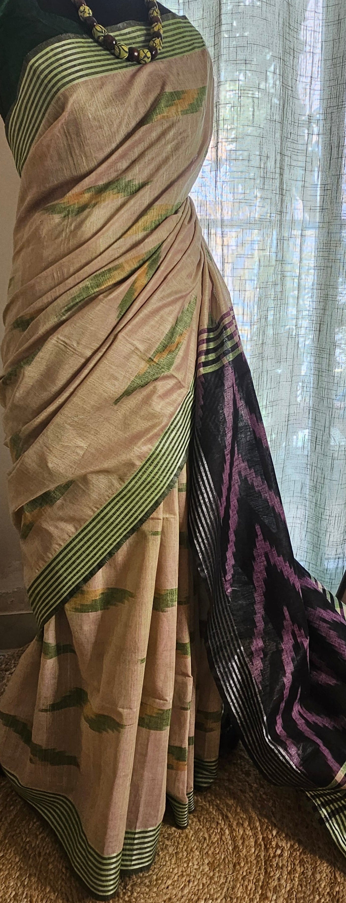 VANAM VARNAM  -  Woven in soft natural tones with striking ikat-inspired detailing
