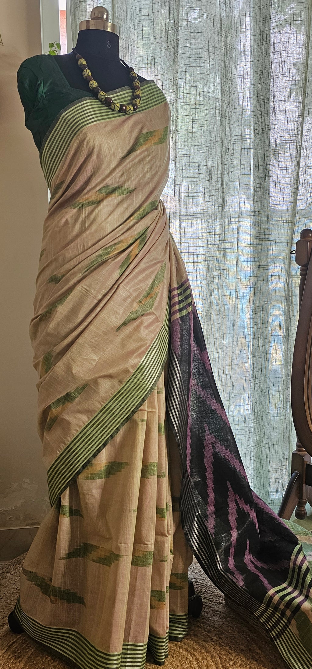 VANAM VARNAM  -  Woven in soft natural tones with striking ikat-inspired detailing