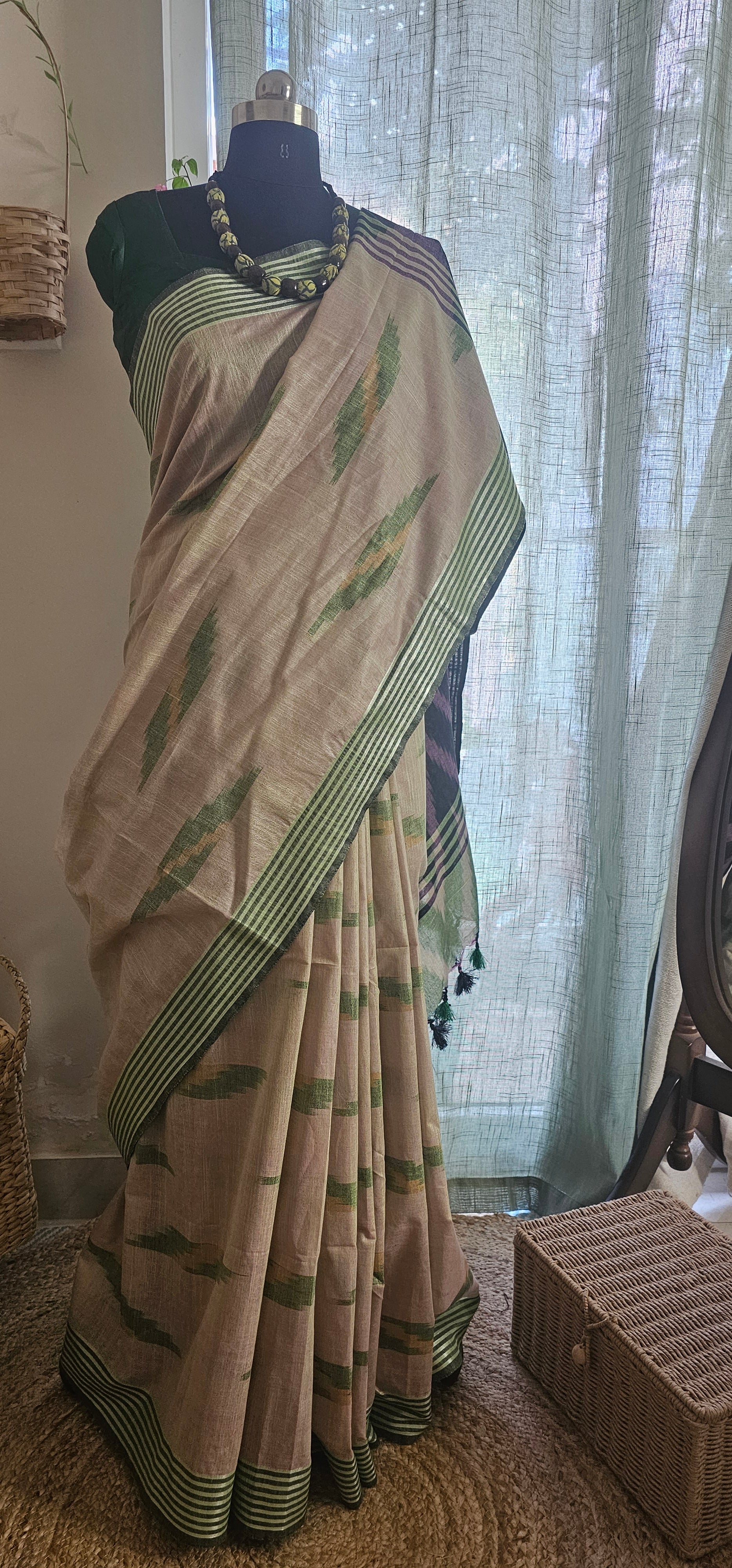 VANAM VARNAM  -  Woven in soft natural tones with striking ikat-inspired detailing