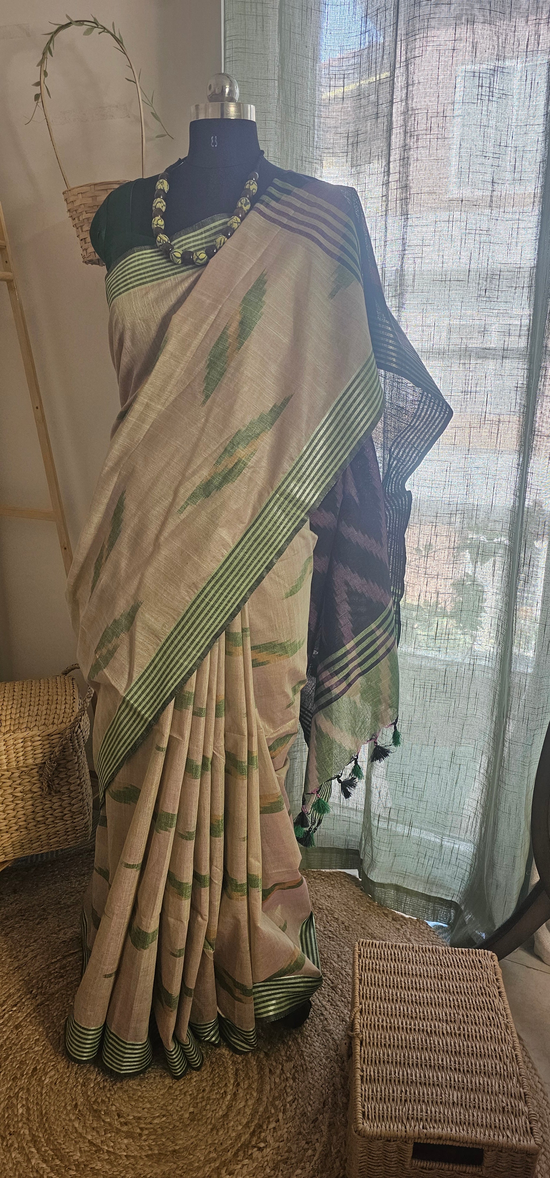 VANAM VARNAM  -  Woven in soft natural tones with striking ikat-inspired detailing