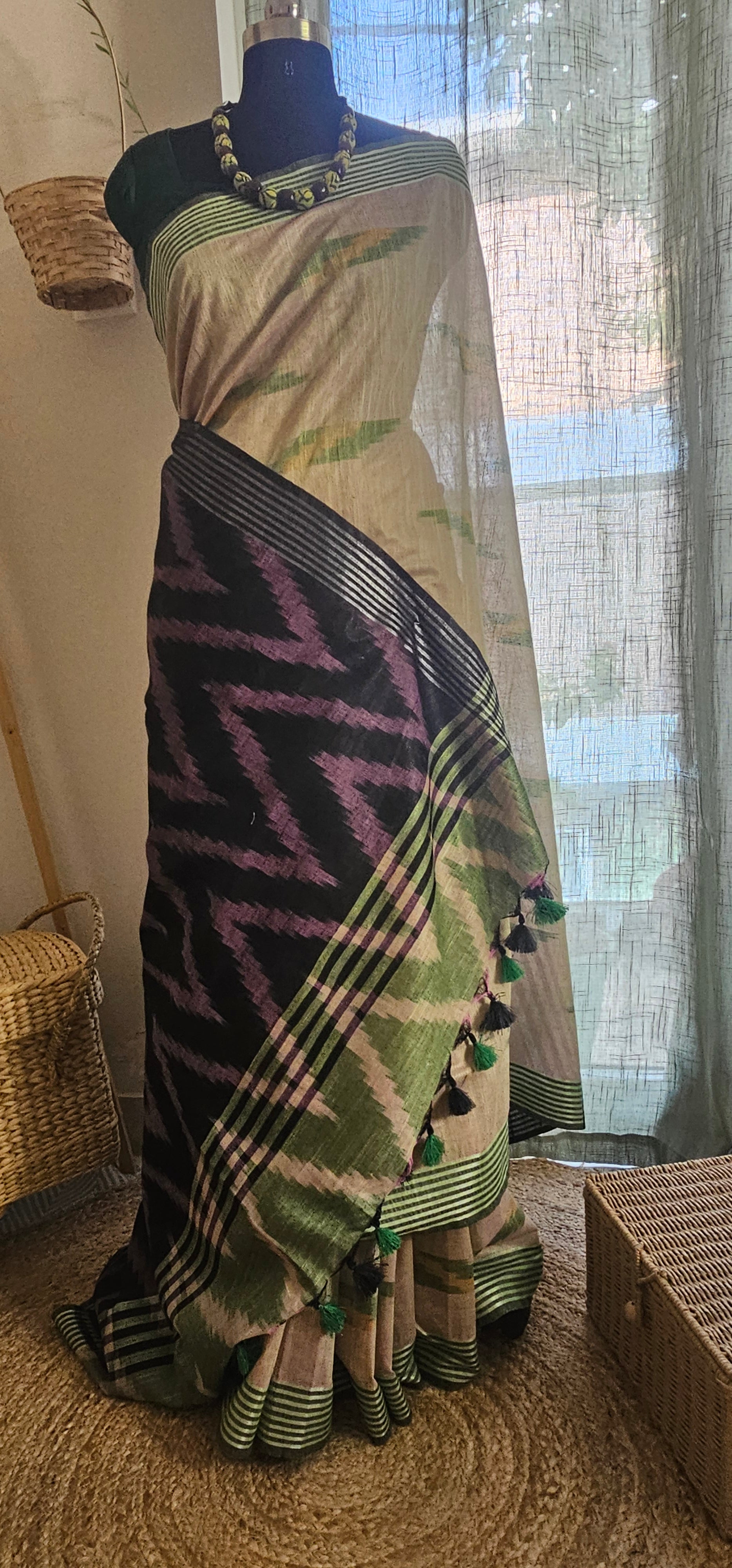 VANAM VARNAM  -  Woven in soft natural tones with striking ikat-inspired detailing